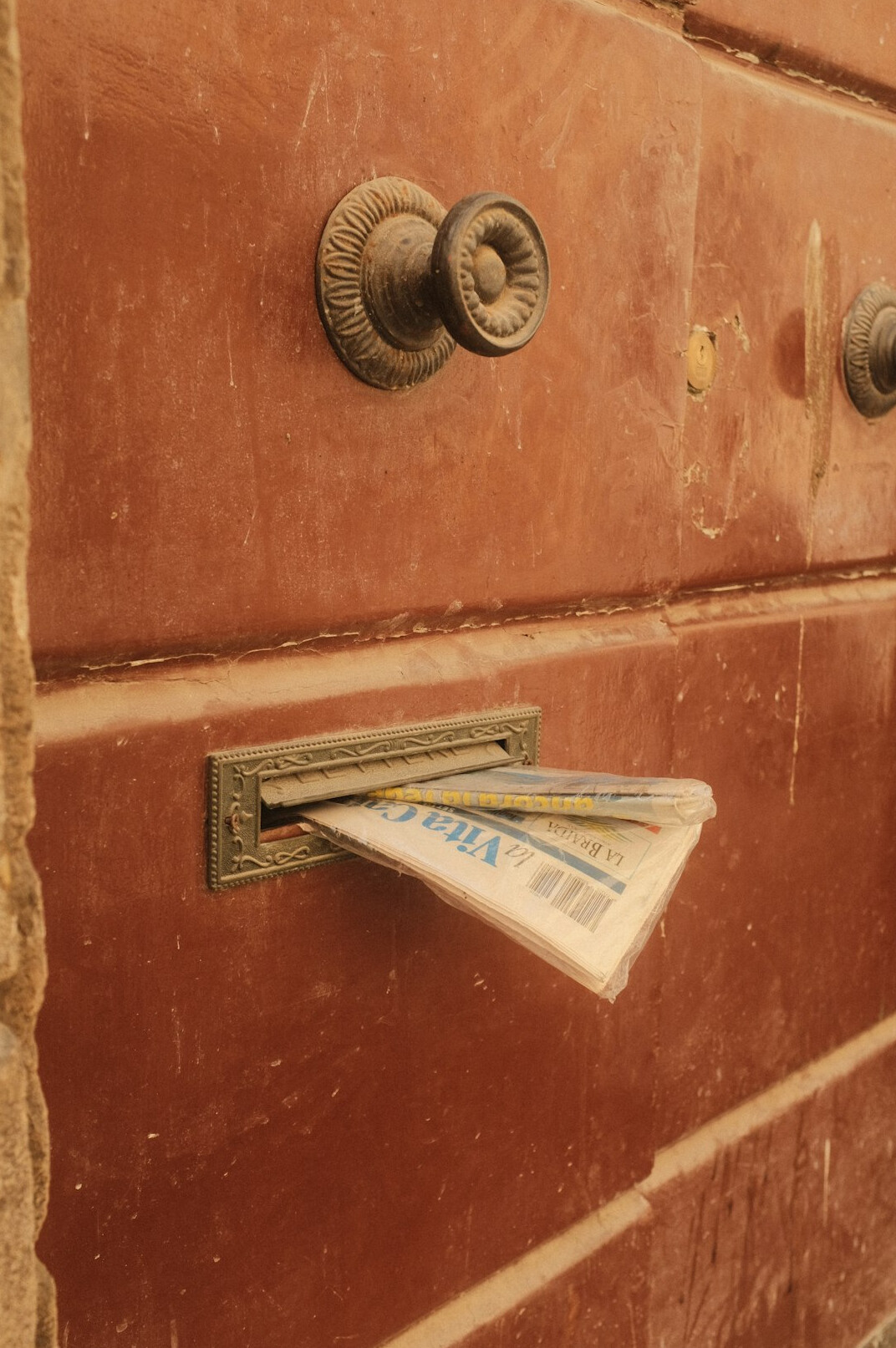 Stack of old newspapers on a wooden table
